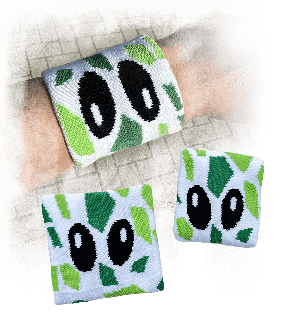 Gepersonaliseerde zweetbandjes met het patroon en de ogen van Freek de Giraffe.