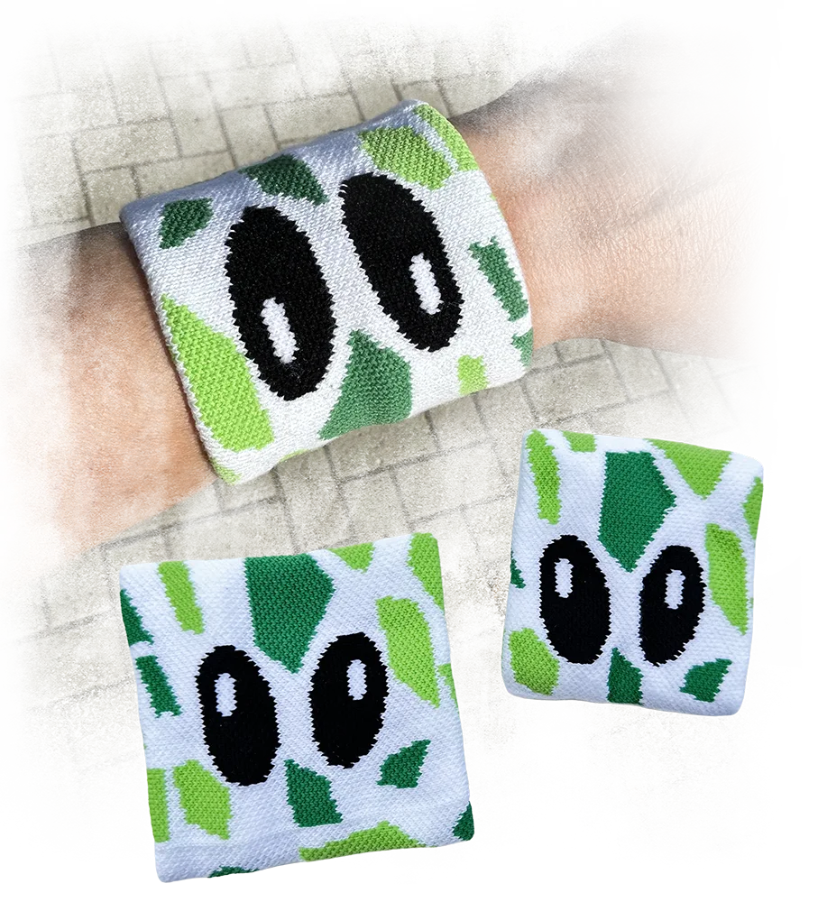 Gepersonaliseerde zweetbandjes met het patroon en de ogen van Freek de Giraffe.